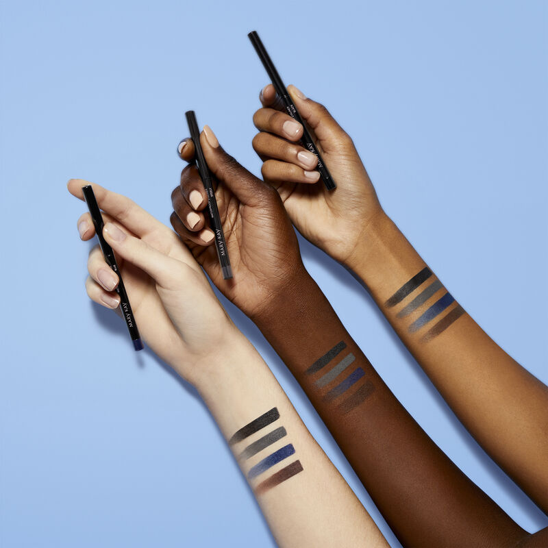 Wrists of fair, medium and deep skin tones with gradient bars of Mary Kay Waterproof Eyeliner in Black, Steely, Blue and Brown.