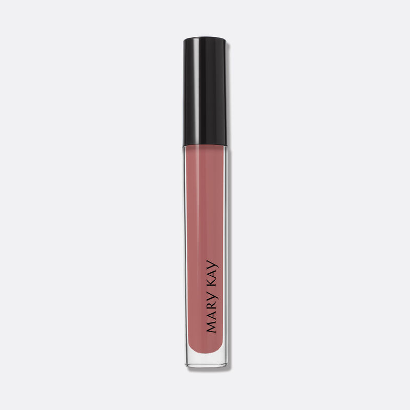 Envase cerrado del tono Nude Blush del Brillo de Labios Unlimited de Mary Kay sobre fondo blanco.