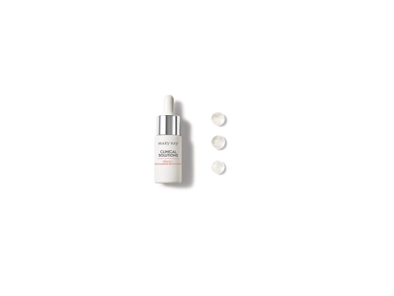 Frasco de Potenciador Fer&uacute;lico + Niacinamida Iluminador Mary Kay Clinical Solutions con gotas a su lado.