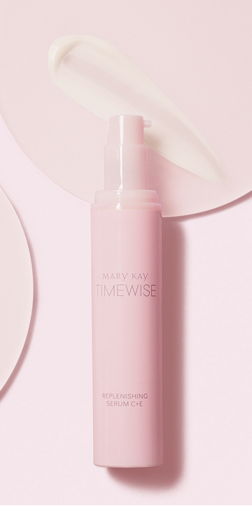 Envase del S&eacute;rum Regenerador C+E TimeWise&reg; sobre fondo rosa con una muestra de producto.